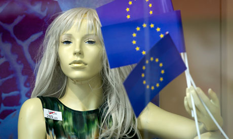 A mannequin in a Zagreb shop window, complete with EU flags